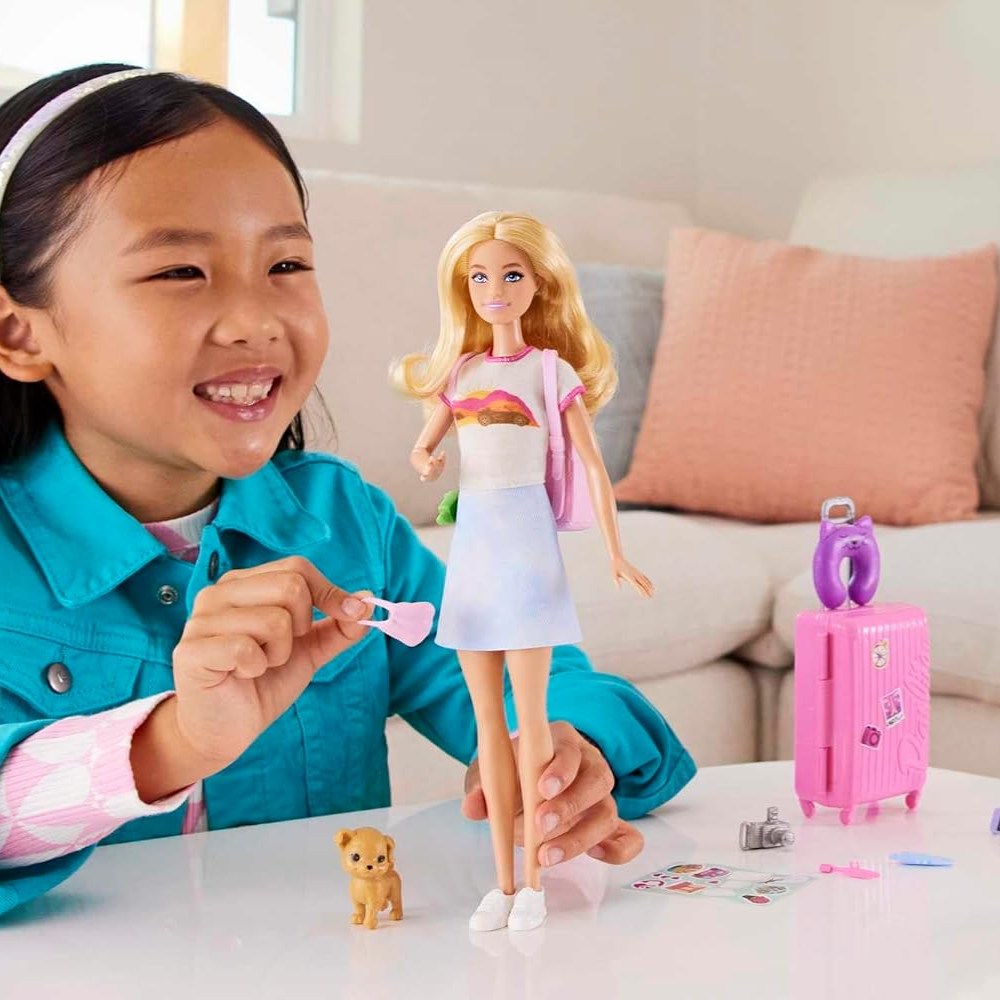 Barbie Doll and Accessories, 'Malibu' Travel Set with Puppy and 10+ Pieces Including Working Suitcase. The suitcase opens and closes, offering a hands-on experience that teaches kids to stay organized while they pack for Barbie’s adventures. HJY18 thumbnail