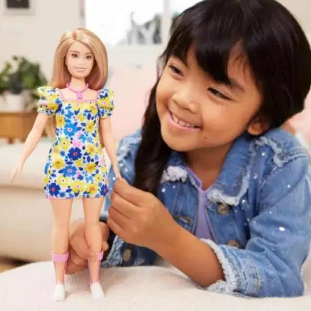 Barbie Fashionistas Doll #208, Doll with Down Syndrome Wearing Floral Dress Barbie® Fashionistas™ dolls inspire endless storytelling, encouraging kids to have fun with fashion while imagining everything they can become! HJT05 thumbnail
