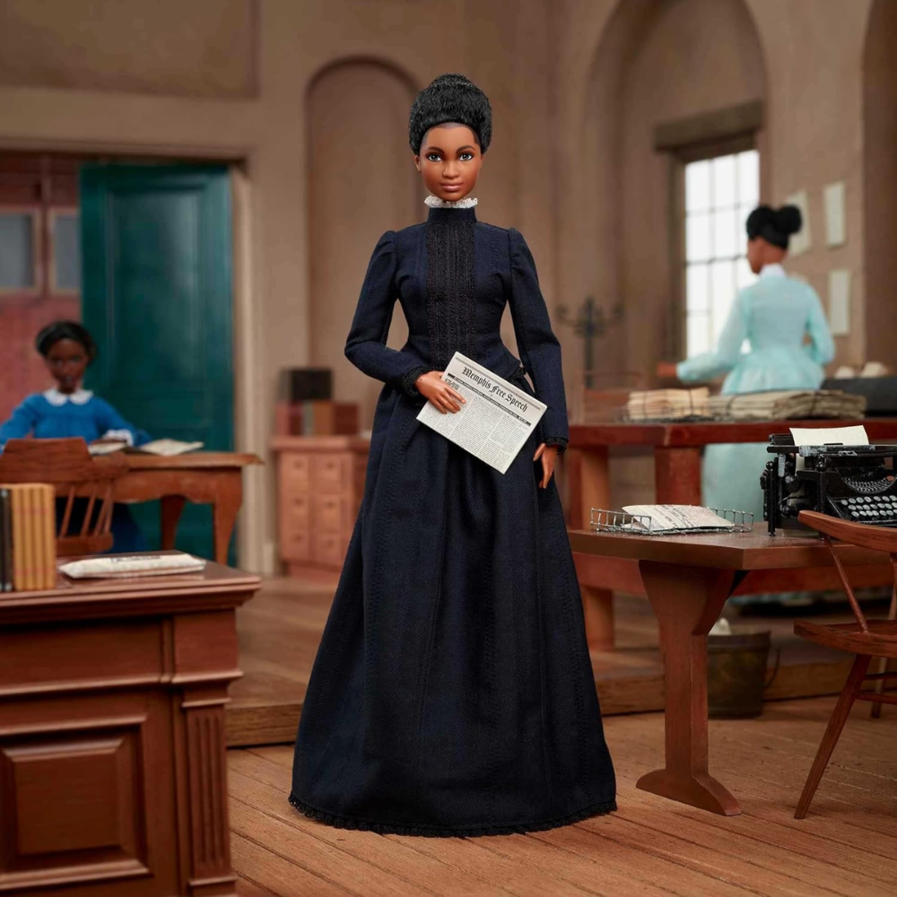 Barbie Inspiring Women Doll, Ida B. Wells Collectible with Blue Dress & Newspaper thumbnail