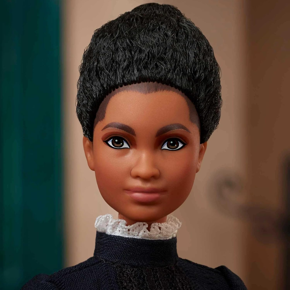 Barbie Inspiring Women Doll, Ida B. Wells Collectible with Blue Dress & Newspaper thumbnail