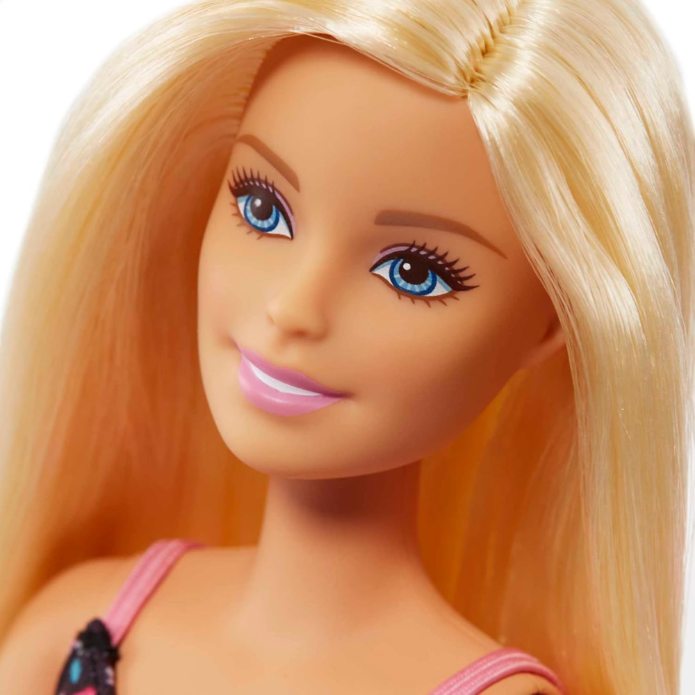 Mattel  Barbie Shopping Time Doll. Join Barbie for a shopping spree! With her blonde hair, blue eyes, and a stylish black dress adorned with pink flowers, along with tall white sneakers, Barbie is all set for summer fun and everyday errands. GTK94 thumbnail