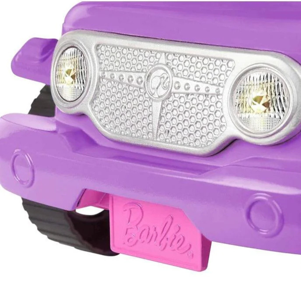 Barbie Toy Car, Purple Off-Road Vehicle. With its bold purple body and stylish pink seats, this Barbie off-road vehicle stands out, encouraging imaginative storytelling and adventure-filled play. GMT46 thumbnail