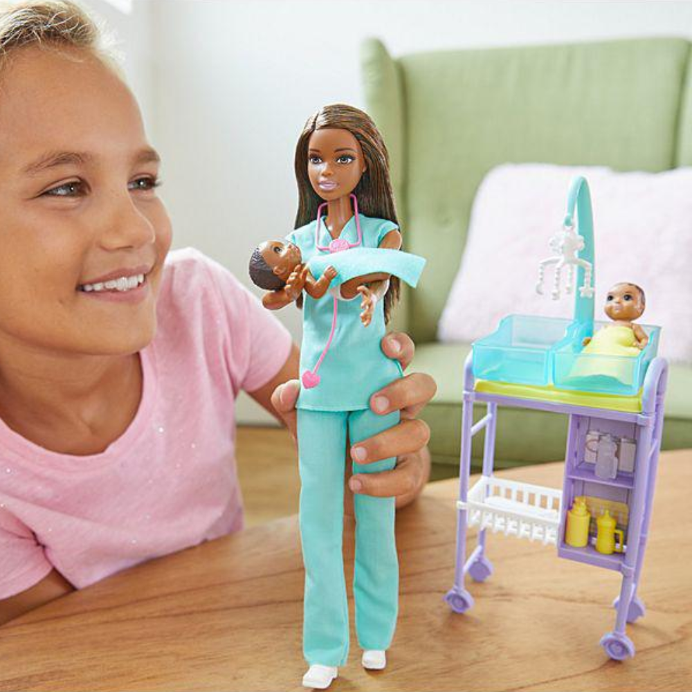 Barbie Baby Doctor Playset with Brunette Doll, 2 Infant Dolls, Exam Table and Accessories thumbnail