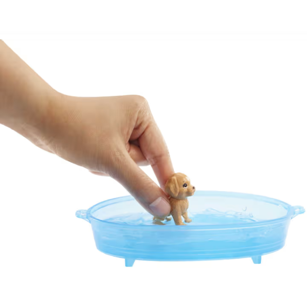 Mattel Barbie Pets & Accessories - Blonde. Barbie has a special love for animals, especially puppies, and she’s caring for three adorable pups that need a bath. GDJ37 thumbnail