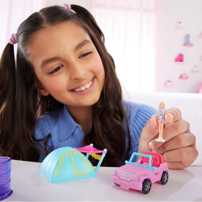 Barbie Mini BarbieLand Playsets with Toy Vehicle & 1.5-inch Doll, SUV.  This tiny version of the iconic Barbie SUV includes a fun color-change feature and a cute tent accessory for outdoor adventures. HYF43 thumbnail