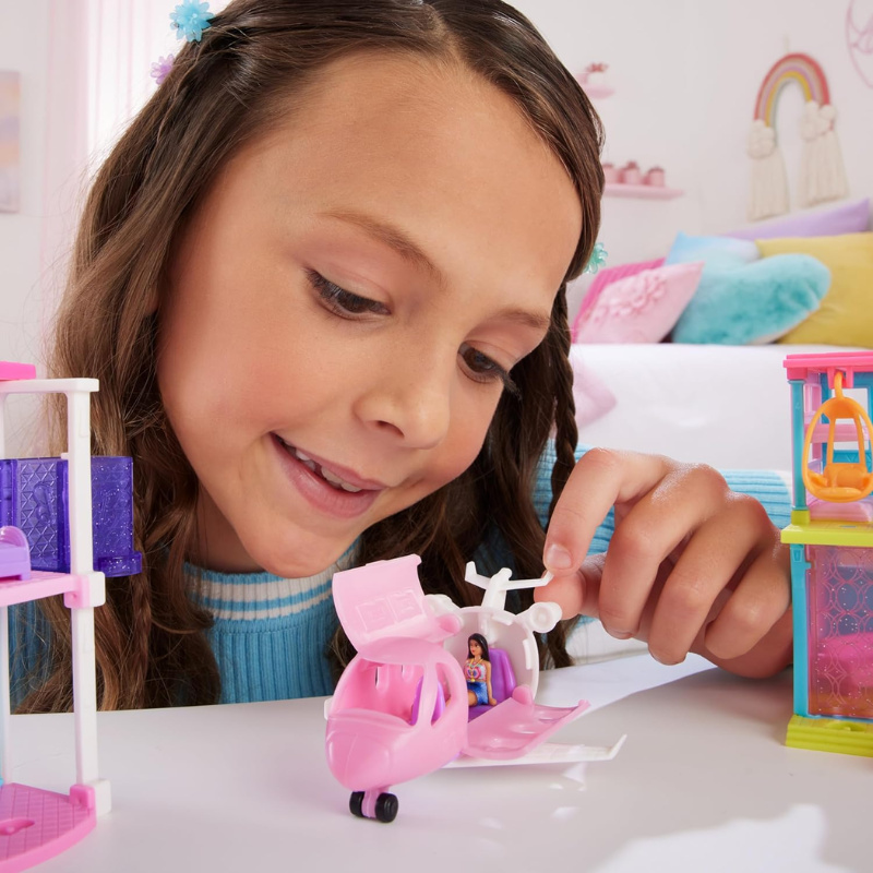 Barbie Mini BarbieLand Toy Vehicle Playset with 1.5-inch Doll & DreamPlane. This scaled-down version of the iconic Barbie Dreamplane features working doors and an exciting color-change transformation for added fun! HYF40 thumbnail