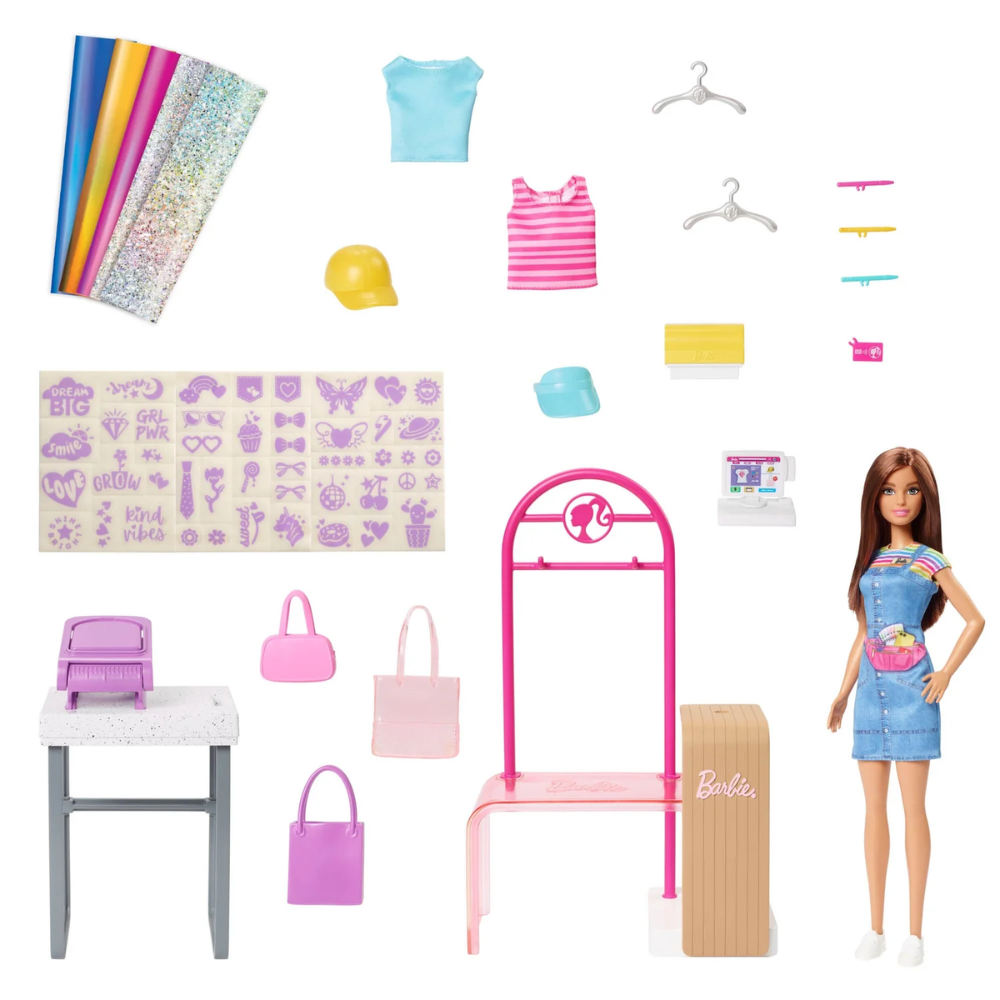 Barbie Make & Sell Boutique Playset with Brunette Doll, Foil Design Tools, Clothes & Accessories. Kids can stitch their way into the fashion world with the Barbie Make & Sell Boutique playset! HKT78 thumbnail