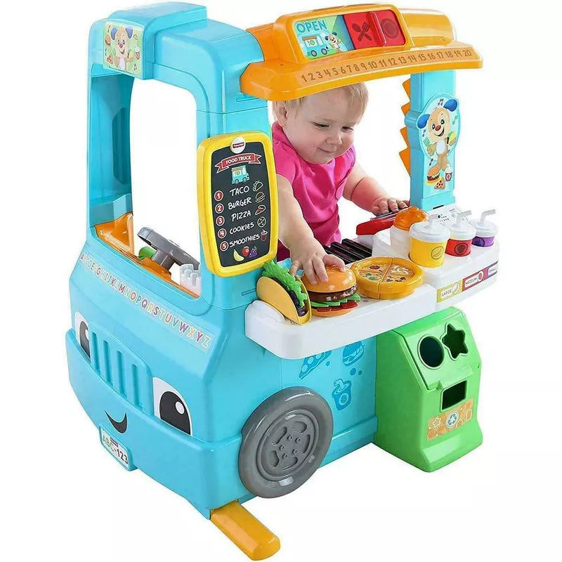 Fisher-Price Laugh & Learn Servin' Up Fun Food Truck with 20+ Piece Accessory Set