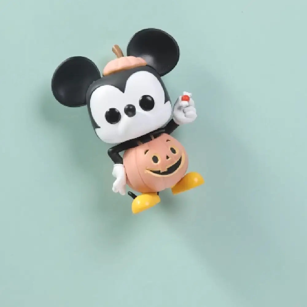 Funko POP Disney: Disney Mickey Trick or Treat (GLOW) EXCLUSIVE.  This figure boasts a glow-in-the-dark feature that adds an enchanting touch to any collection, making it especially fun for nighttime display.  F-65035 thumbnail