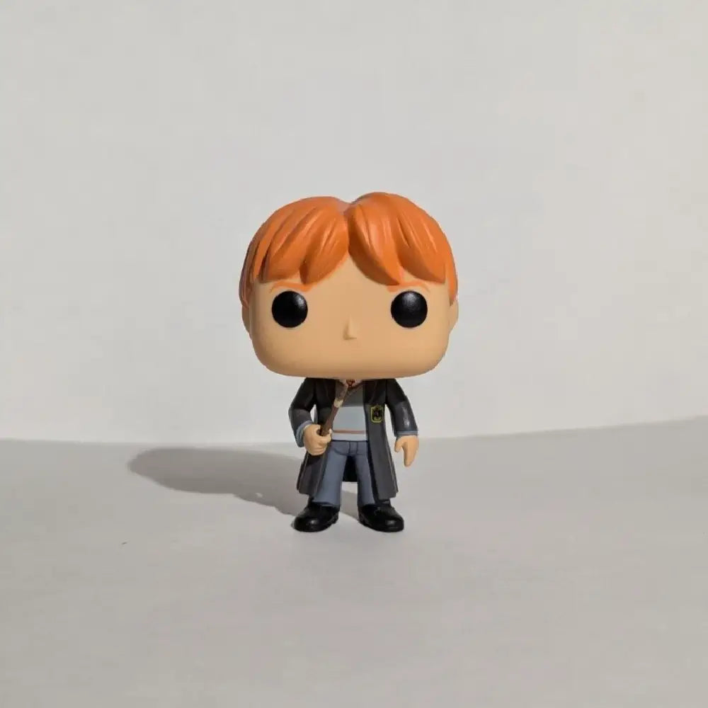 Funko Pop Movies - Harry Potter - Ron Weasley Action Figure 02. Ron Weasley has joined the growing collection of POP! products.  Who is Ron Weasley? Ron is a member of the Weasley family and Harry Potter’s closest friend. F-5859 thumbnail