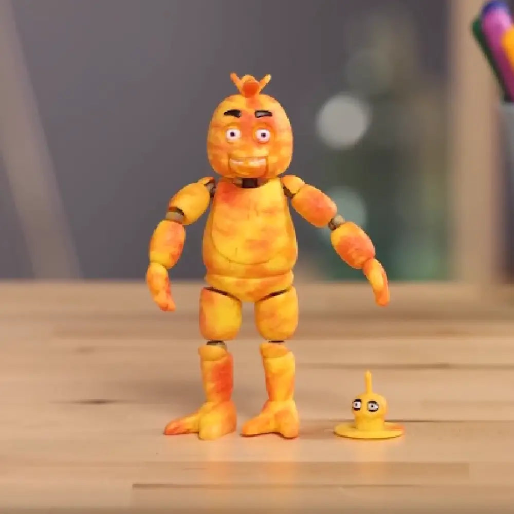 Funko Pop! Action Figure: Five Nights at Freddy's Tie Dye- Chica. The colorful tie-dye design contrasts with Chica’s spooky features, making this collectible a standout addition for fans. F-64217 thumbnail