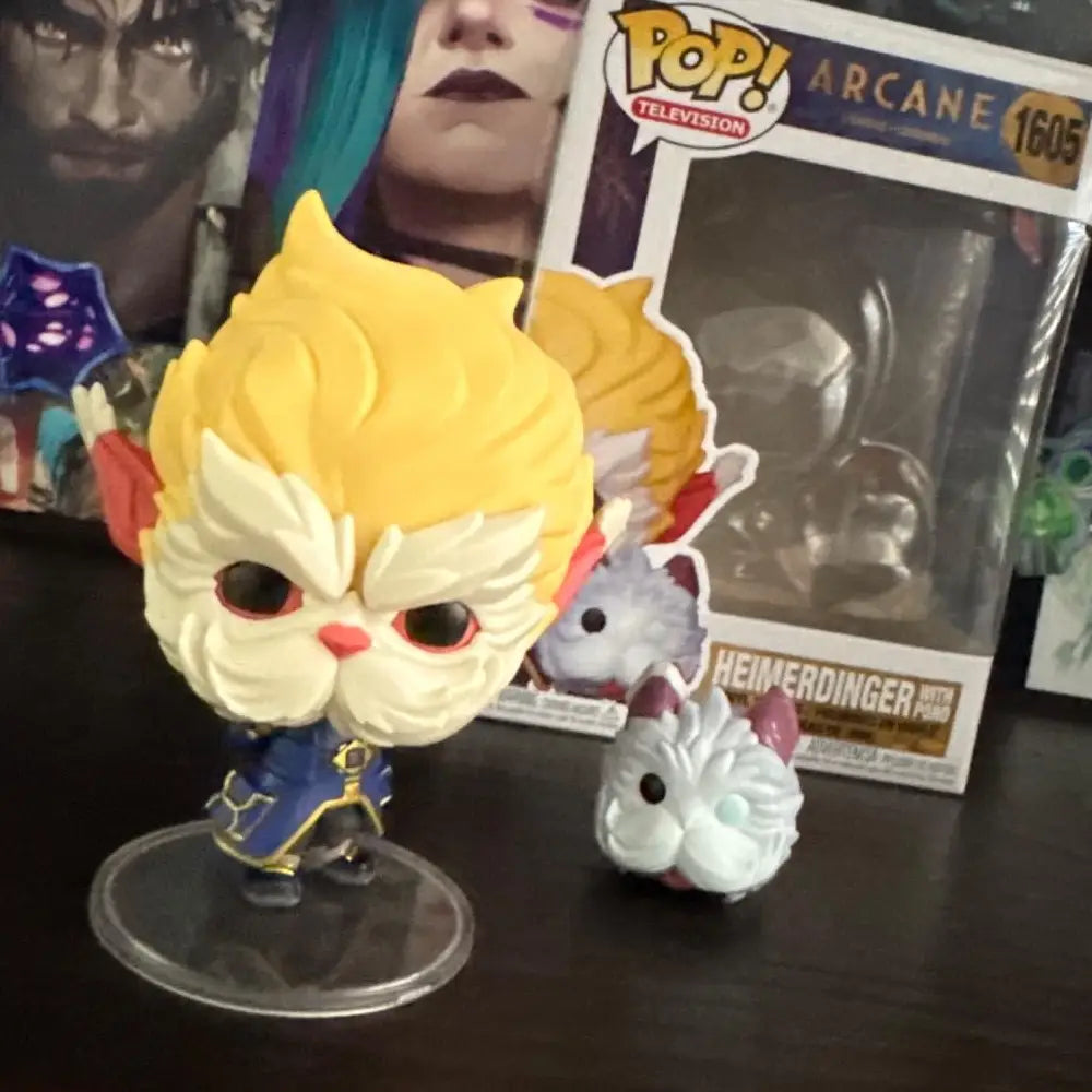 Funko Pop! TV: Arcane League of Legends - Heimerdinger with Poro. The conflict between Piltover and the Undercity is intensifying! Assemble your team and get ready for combat with Pop! Heimerdinger with Poro! F-80193 thumbnail