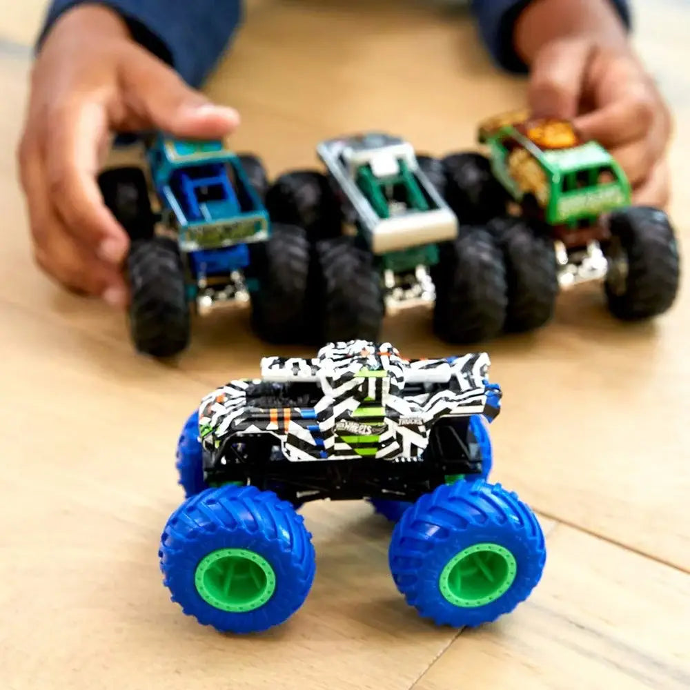 Hot Wheels Monster Trucks 1: 64 Scale 4-Truck Pack (Styles May Vary) This set features a range of distinct Monster Trucks, offering exciting options for kids and collectors while immersing them in the imaginative world of Hot Wheels. GBP23 thumbnail