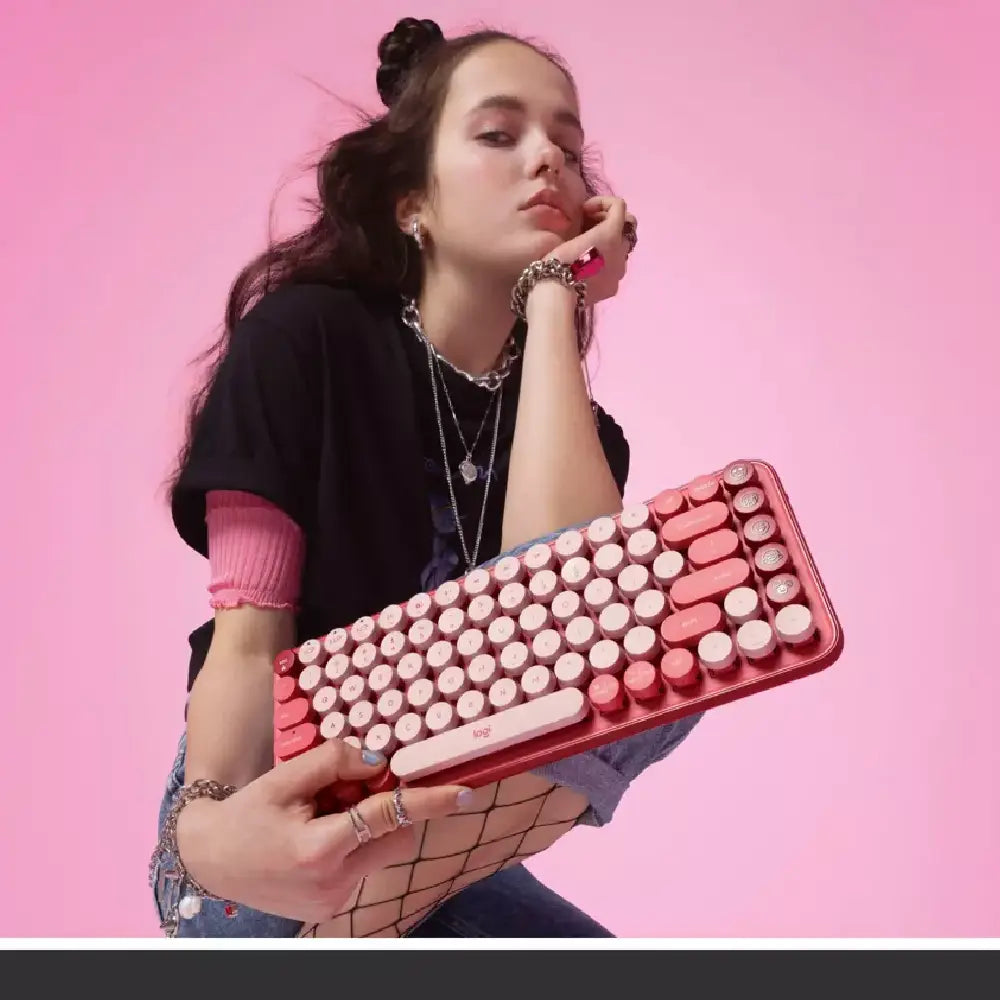 Logitech POP Keys Wireless Bluetooth Mechanical Keyboard - Rose. Designed for both style and function, POP Keys includes 8 swappable emoji keys (4 pre-installed, 4 extra in the box) and 1 dedicated emoji menu key. 920-010709 thumbnail