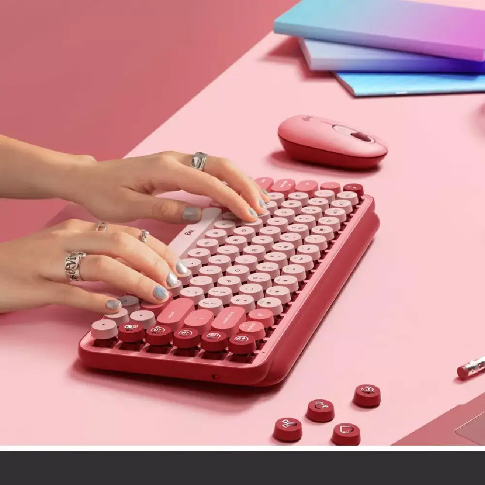 Logitech POP Keys Wireless Bluetooth Mechanical Keyboard - Rose. Designed for both style and function, POP Keys includes 8 swappable emoji keys (4 pre-installed, 4 extra in the box) and 1 dedicated emoji menu key. 920-010709 thumbnail
