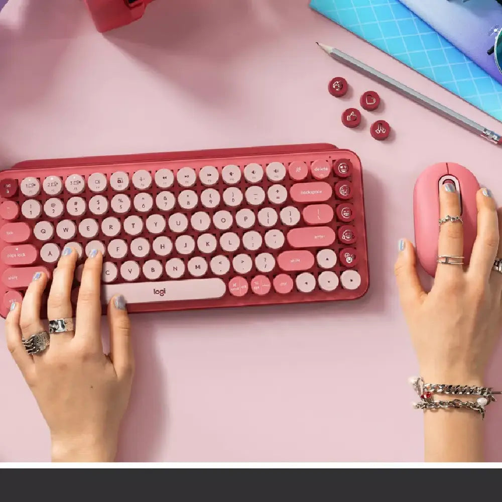 Logitech POP Keys Wireless Bluetooth Mechanical Keyboard - Rose. Designed for both style and function, POP Keys includes 8 swappable emoji keys (4 pre-installed, 4 extra in the box) and 1 dedicated emoji menu key. 920-010709 thumbnail
