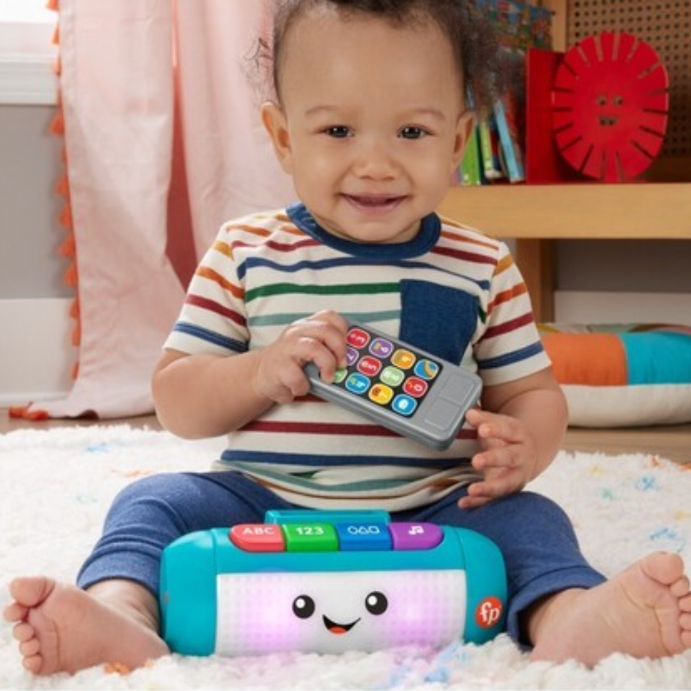 Fisher-Price Laugh & Learn Light Up Learning Speaker Electronic Baby Toy. Start the fun and learning with the Laugh & Learn® Light Up Learning Speaker musical toy from Fisher-Price®. HRJ06 thumbnail