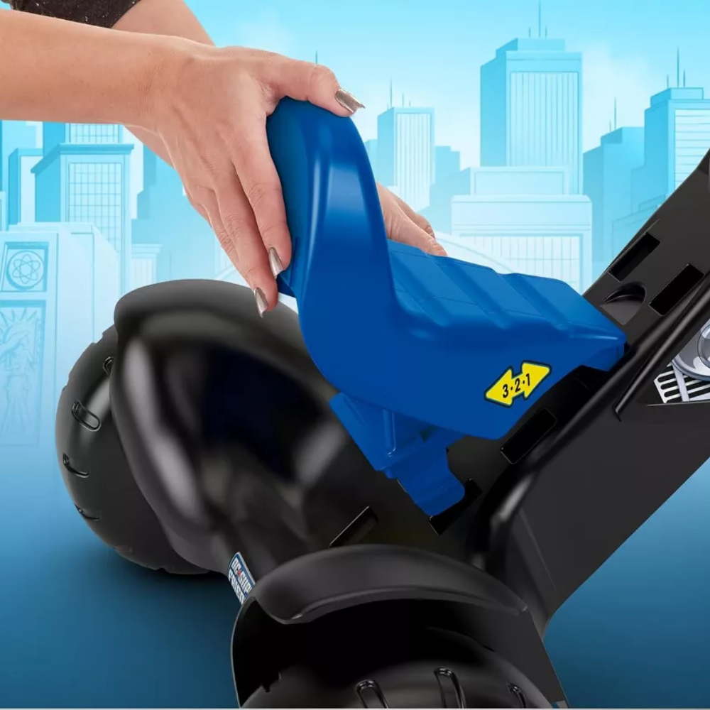 Fisher-Price Toddler Tricycle DC Super Friends Batman Lights & Sounds Trike. This trike lights up and plays action-packed sounds to enhance the fun. It also comes with a toy walkie-talkie that features voice lines from Batman himself. HCF39 thumbnail