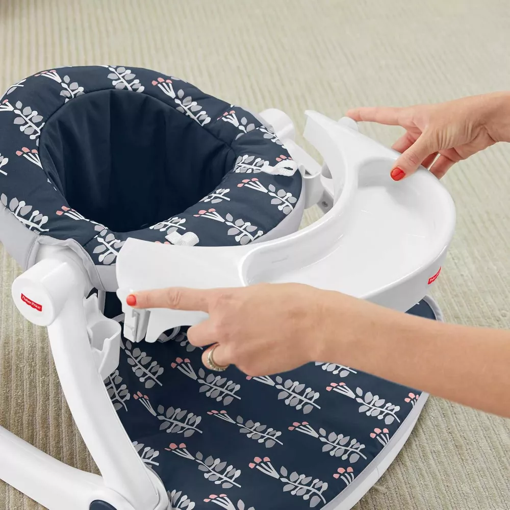 Fisher-Price Portable Baby Chair Sit-Me-Up Floor Seat With Snack Tray And Developmental Toys, Navy Garden. Easy to fold and lightweight, this seat is portable and ideal for both home use and on-the-go adventures. GMD19 thumbnail