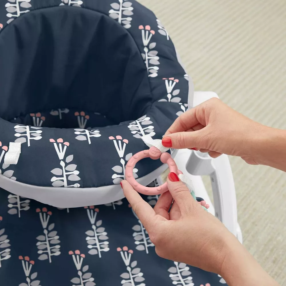 Fisher-Price Portable Baby Chair Sit-Me-Up Floor Seat With Snack Tray And Developmental Toys, Navy Garden. Easy to fold and lightweight, this seat is portable and ideal for both home use and on-the-go adventures. GMD19 thumbnail