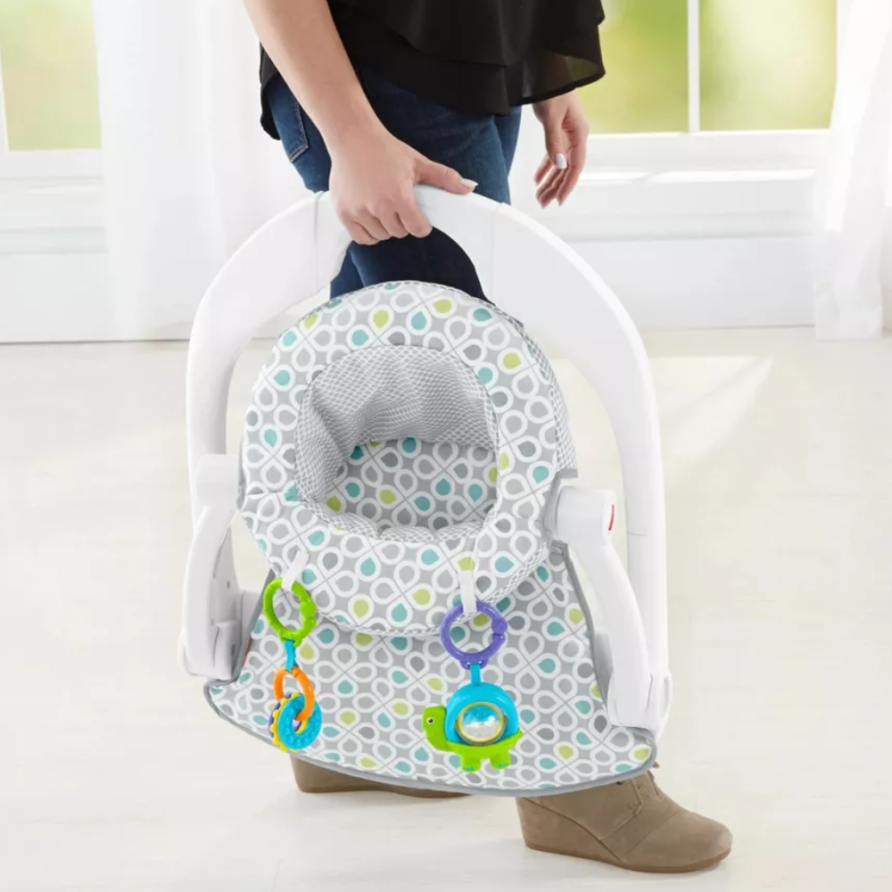 Fisher-Price Portable Baby Chair Sit-Me-Up Floor Seat With Developmental Toys. The Sit-Me-Up Floor Seat is thoughtfully designed to support healthy posture in infants, providing comfort and stability during playtime while keeping your baby safe. GGD48 thumbnail