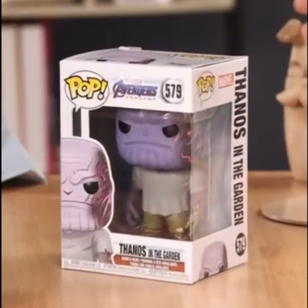 Funko Pop! Marvel: Avengers Endgame - Casual Thanos with Gauntlet. Thanos wears the Infinity Gauntlet on his left hand for a strategic reason—he is naturally right-handed. F-45141 thumbnail