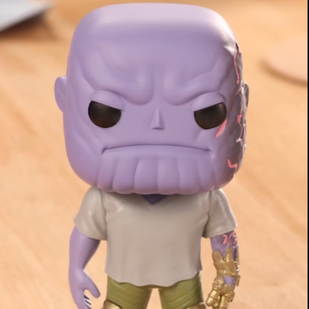 Funko Pop! Marvel: Avengers Endgame - Casual Thanos with Gauntlet. Thanos wears the Infinity Gauntlet on his left hand for a strategic reason—he is naturally right-handed. F-45141 thumbnail