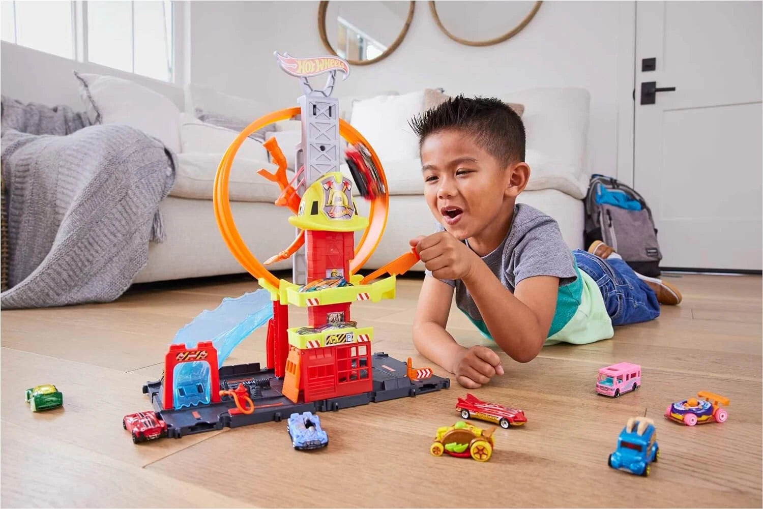 Hot Wheels City Super Loop Fire Station Playset & 1 Toy Firetruck. Perform stunts and race through an adjustable loop to protect Hot Wheels City with the Super Loop Fire Station playset! HKX41 thumbnail